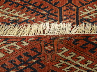 After restoration of the fringes of a Turkoman carpet